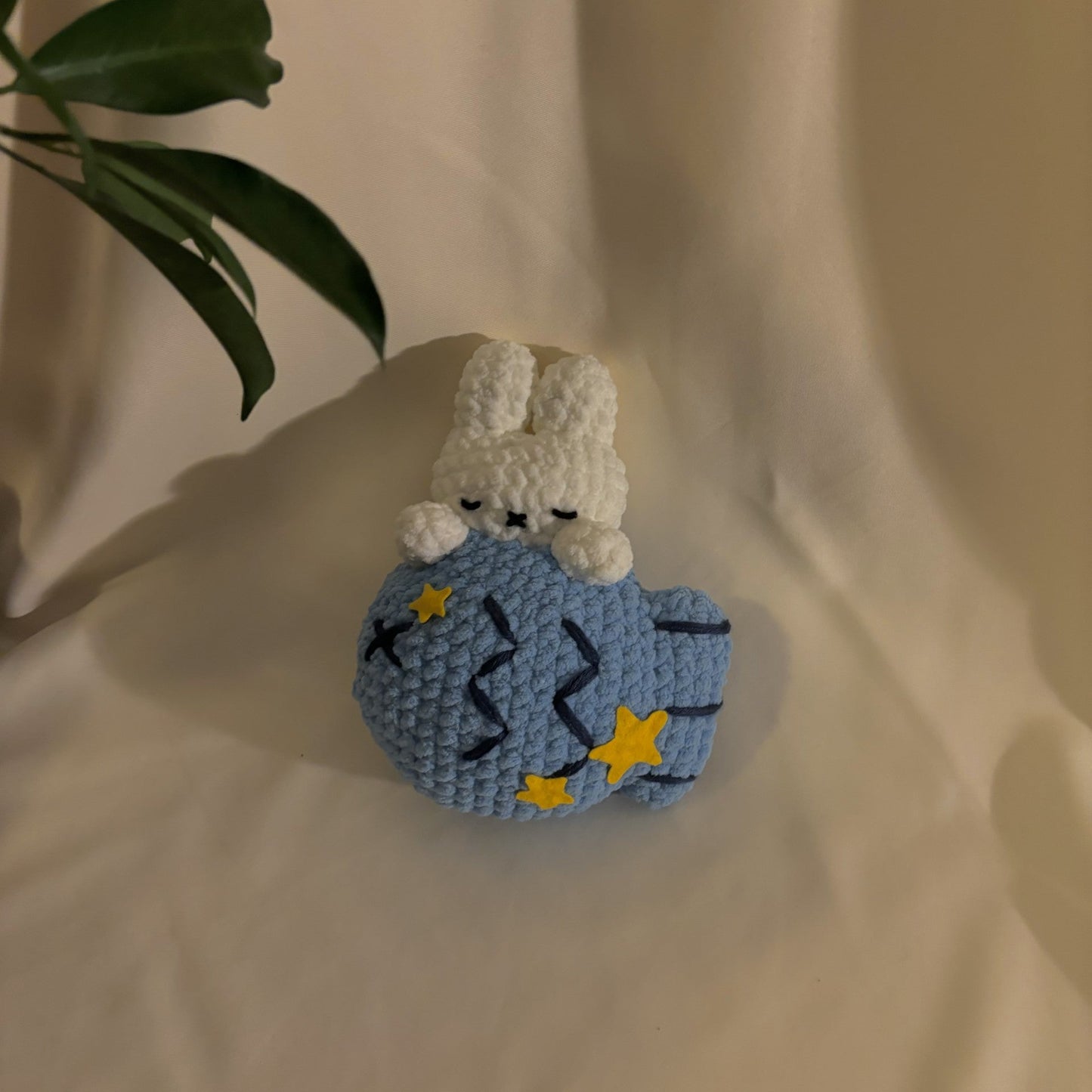 Sleepy Bunny on Fish Plush